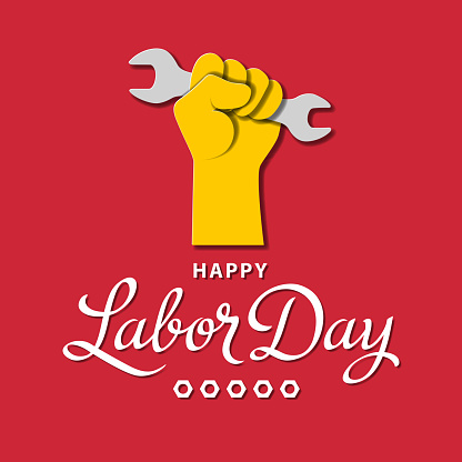 Celebrating the International Labor Day in 1st May with hand holding wrench on the red background showing the right of labor