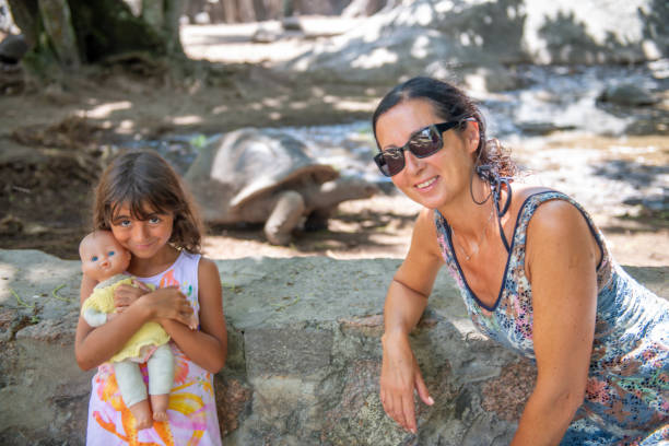 istock Mother and daughter in La Digue, Seychelles 2148366239