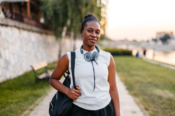 Young Female Jogger On The Quayside