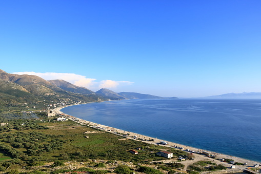 an Aerial view of Borshit beach. Qazim Pali cityscape. Colorful seascape of Adriatic sea, Albania