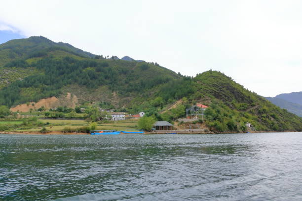 istock Settlement alongside lake Koman in Albania 2148367677