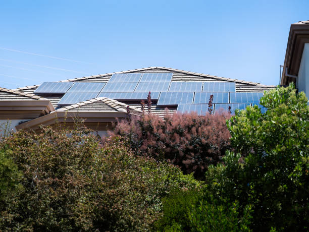 istock Solar panels on residential house rooftop in California. 2148368466