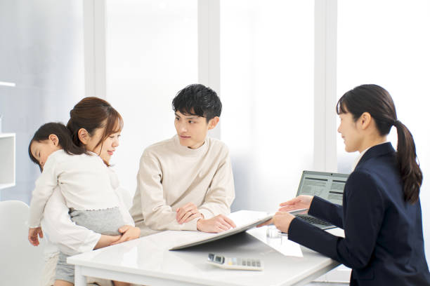 istock A family receiving information about insurance 2148369254