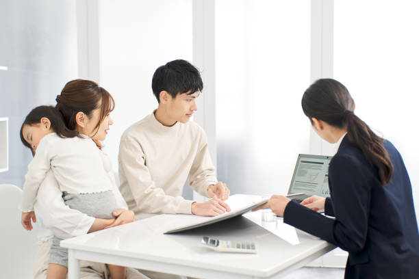 istock A family receiving information about insurance 2148369264