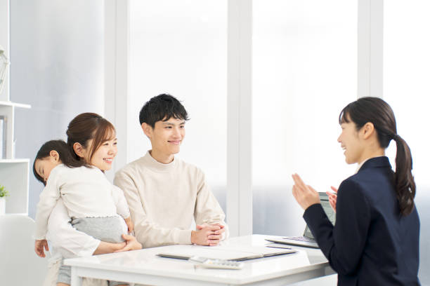 istock A family receiving information about insurance 2148369279