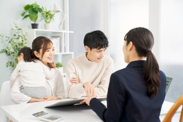 istock A family receiving information about insurance 2148369281