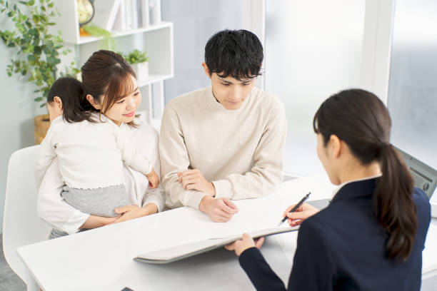 istock A family receiving information about insurance 2148369293