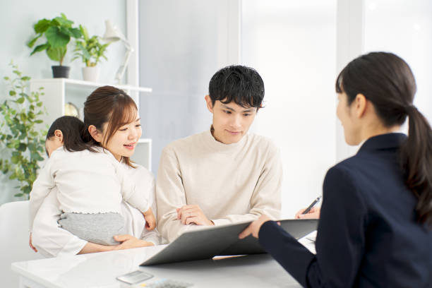 istock A family receiving information about insurance 2148369301