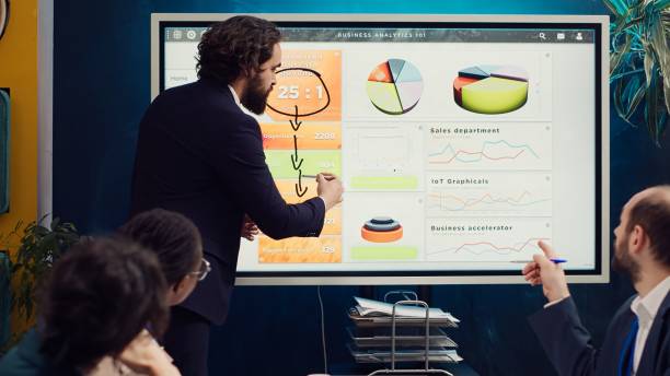 istock Project manager does a market research presentation for his team 2148369410