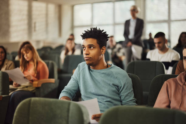 istock Young black male student on a class in amphitheater. 2148370995