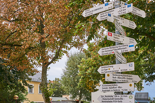Selb, Germany - October 07, 2023: Signs with distances and hiking routes in Selb bei Hof in Upper Franconia.