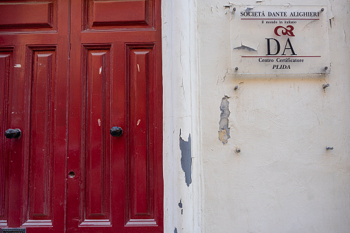 Valletta, Malta, April 02, 2024. the sign of the Dante Alighieri Society maltese branch in the city center
