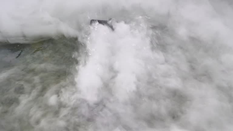 Video footage of white mist used to decorate the base of the fountain to create a beautiful atmosphere on the water surface.