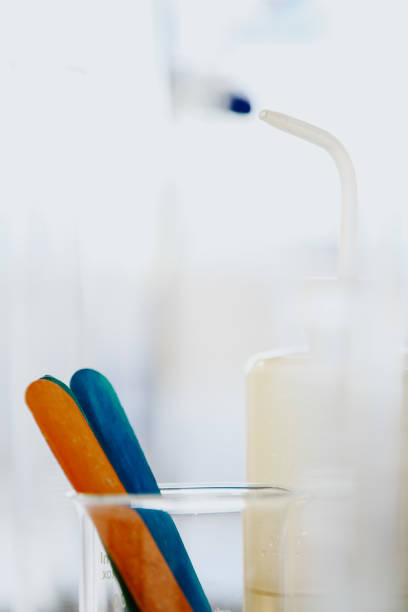 istock Colorful test tubes in wooden stand 2148373215
