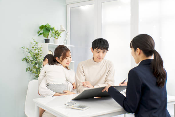 istock A family receiving information about insurance 2148375749