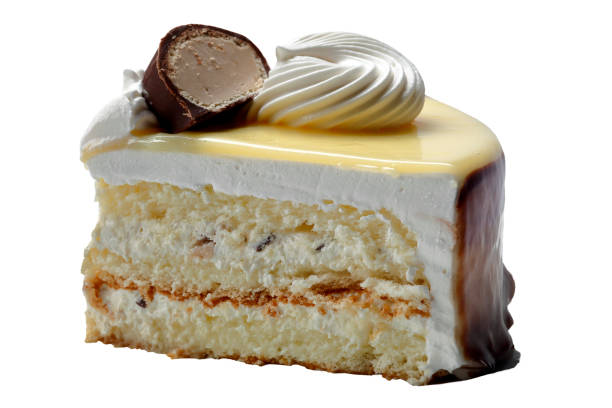 Slice of cake with chocolate bonbon and whipped cream
