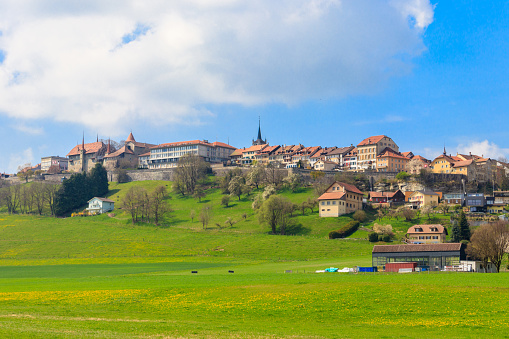 View of old Swiss town Romont, built on a rock prominence, in Freibourg canton, Switzerland