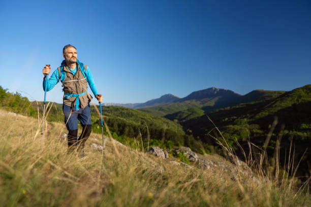 Man on a hiking trip in the mountains.