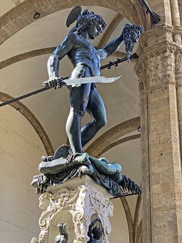 Bronze statue of Perseus holding the head of Medusa in Florence, Piazza della Signoria square, made by Benvenuto Cellini in 1545