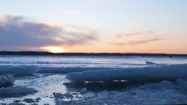 Ice on the sea at sunset 2/2.