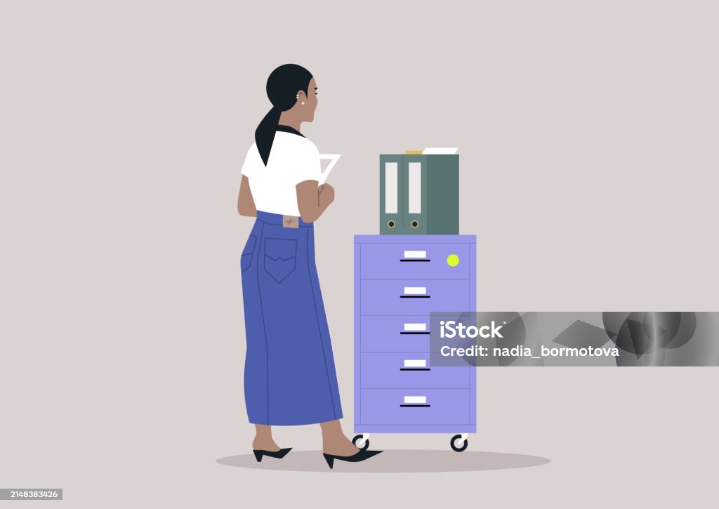 Employee Organizing Files In A Modern Office Setting A Person Stands By ...