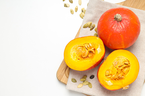 Cooking ingredients for fall season - pumpkin seeds, pumpkin