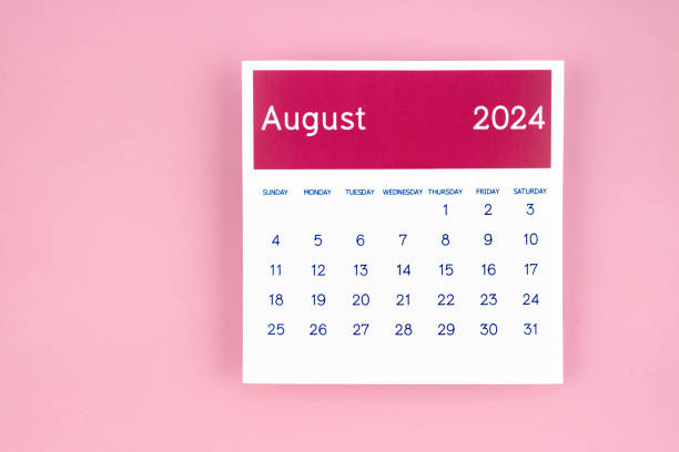 istock Calendar page August 2024 on pink background. 2148385305
