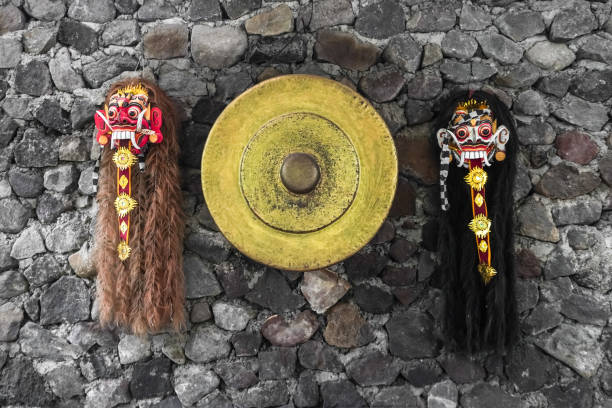 close up photo of traditional leak rangda mask costume for a bali dance theater performance. handcrafted masks in the form of legendary demons in bali, indonesia. - rangda стоковые фото и изображения