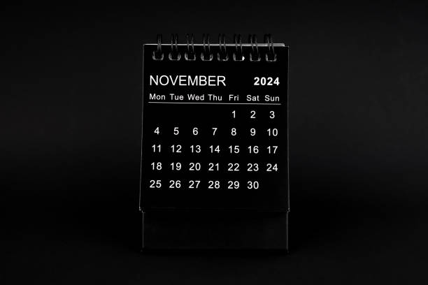 istock Black Calendar for November 2024 . Desktop calendar on a black background. 2148385528