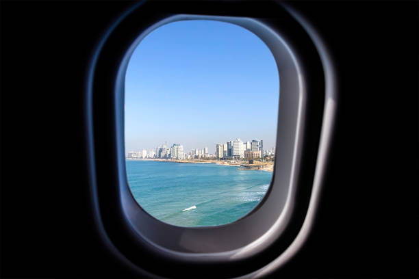 istock View through a jet plane window on Tel Aviv beach in Israel 2148386648
