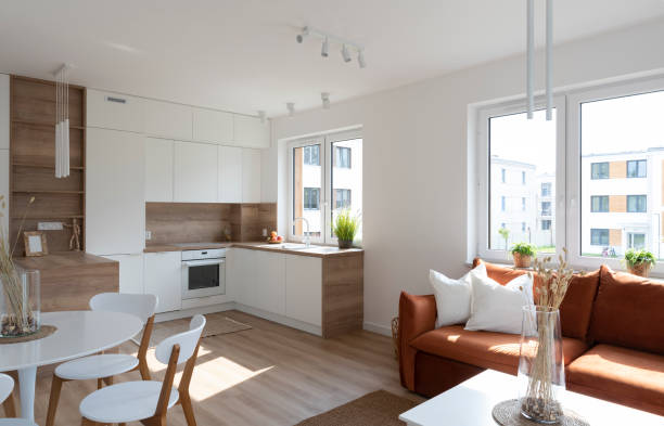 istock Modern interior in design style with kitchen and living room with window. New apartment with fashionable furniture. 2148386941