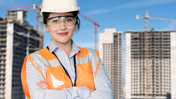 istock engineer woman wear helmet 2148387350