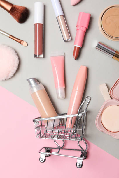 istock Golden shopping basket with pink makeup accessories 2148387552