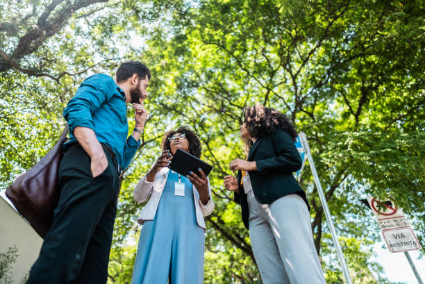istock Coworkers talking in the street 2148388764
