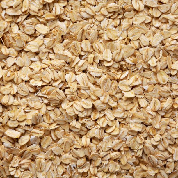 istock Dry Organic Rolled Oats Background 2148389081