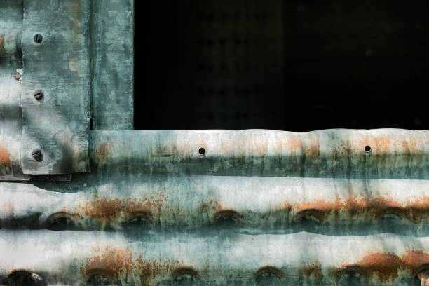 istock Corroded,. galvanized side of old silo with darkened opening 2148389762