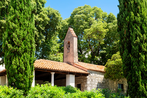 Holy Trinity Chapel in mediterranean park of Lovran view, Opatija riviera of Croatia