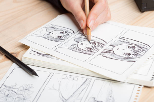 istock Artist drawing an anime comic book in a studio. 2148390481