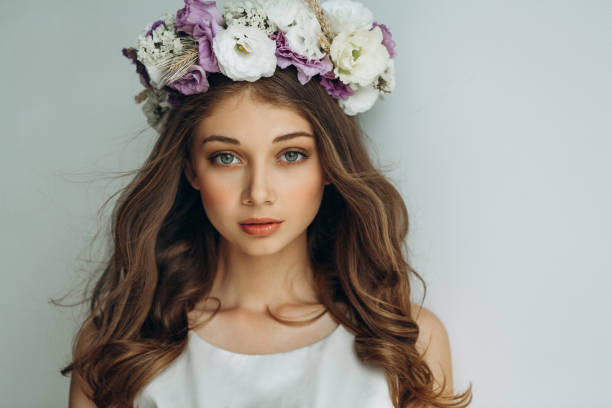 istock Young sensual girl with a wreath on her head 2148393855