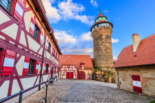 Nuremberg, Germany - February 1, 2023: Courtyard of the Imperial Castle with the Sinwell Tower (Sinwellturm). Franconia, Bavaria.