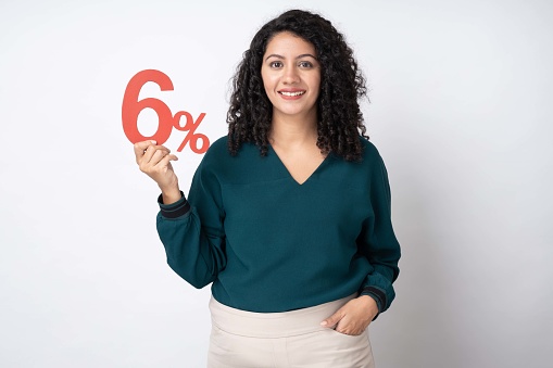 Portrait of young businesswoman with curly hairstyle wear trendy smart casual outfit isolated on white background