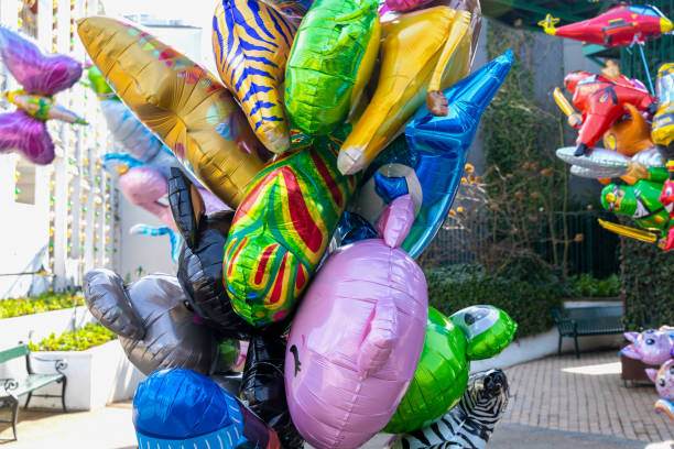 istock Many colorful helium balloons for children 2148397965