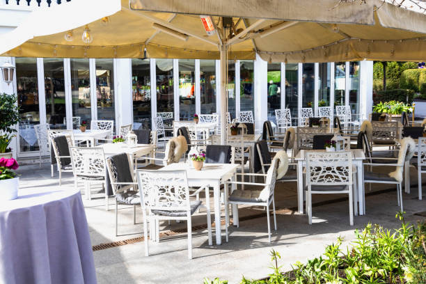 istock Cozy street cafe with empty tables 2148398072