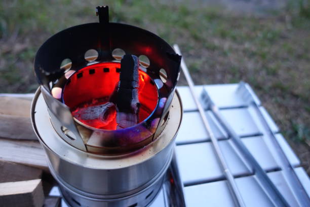 istock Solo camping with a fire stove 2148398354
