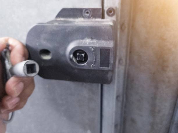 istock Open the machine door with the lock 2148399247
