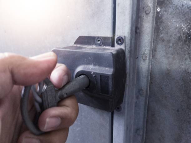 istock Open the machine door with the lock 2148399266