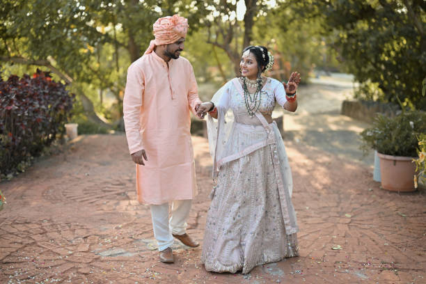 istock Bridal joyful entry with brother during her wedding 2148399833