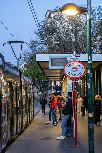Vienna, Austria April 5, 2024 People at a tram stop on Schwedenplatz
