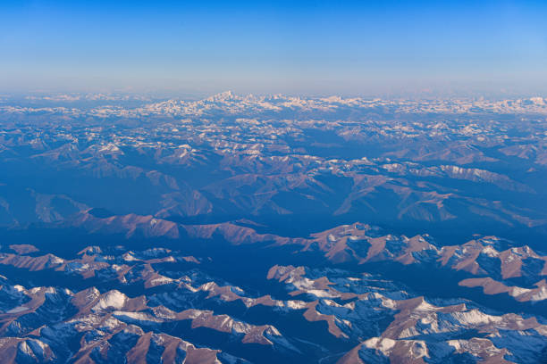 Aerial view of snow capped mountains in Sichuan and Tibet, China