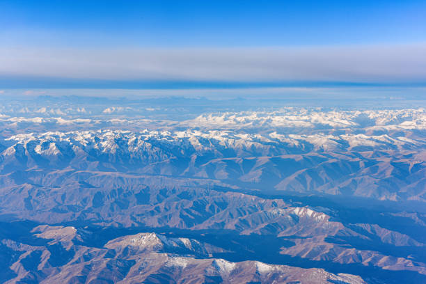 istock Aerial view of snow capped mountains 2148401139